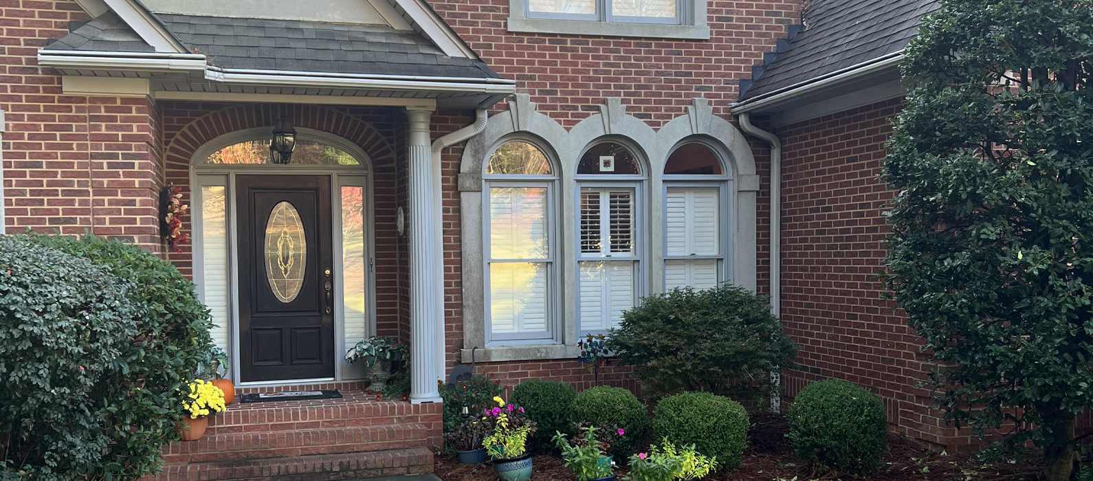 Double Hung Windows on a brick home. 