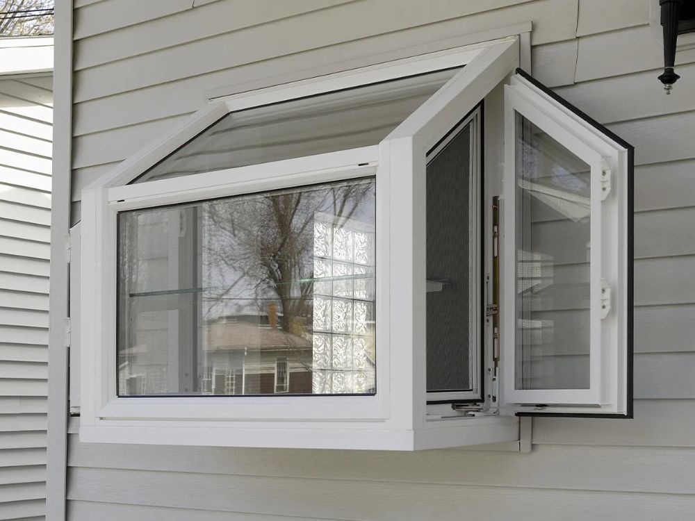 Roof being replaced. Shingles off. New underlayment paper showing.