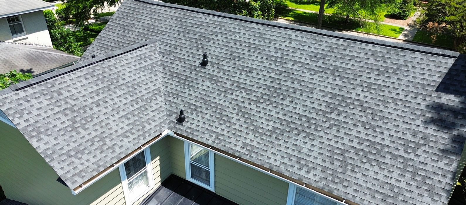 New gray shingle roof shown from an overhead view.